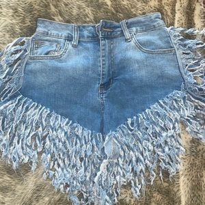 Distressed shorts. New without the tag, only tried on once. Size SMALL